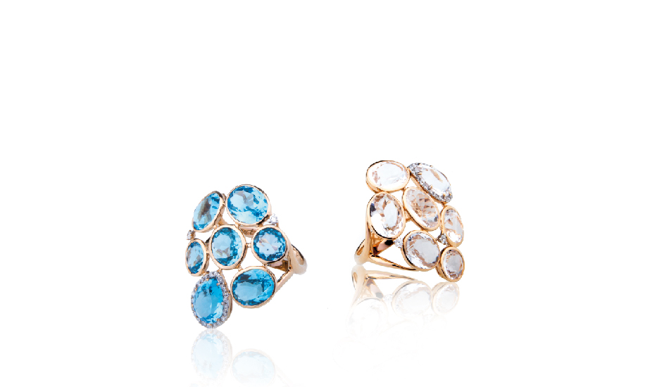 <p>18kt pink gold rings with blue topaz, crystal rock and diamonds</p>