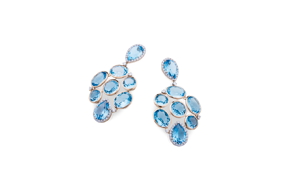 <p>Pendientes en oro rosa 18ktes con topacio azul y diamantes</p>