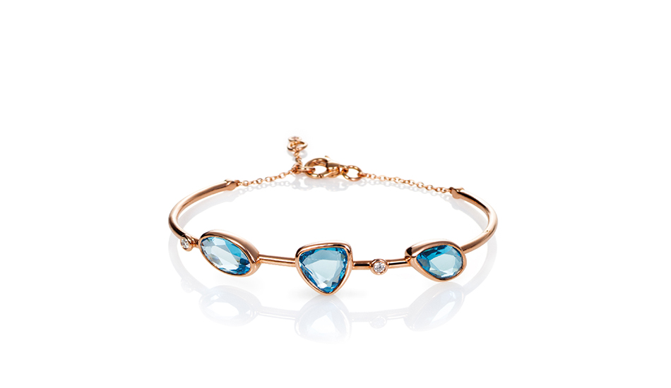 Bracciale in oro rosa 18kt con topazio azzurro e diamanti