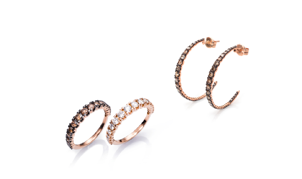 18kt pink gold rings and earrings with white and brown diamonds