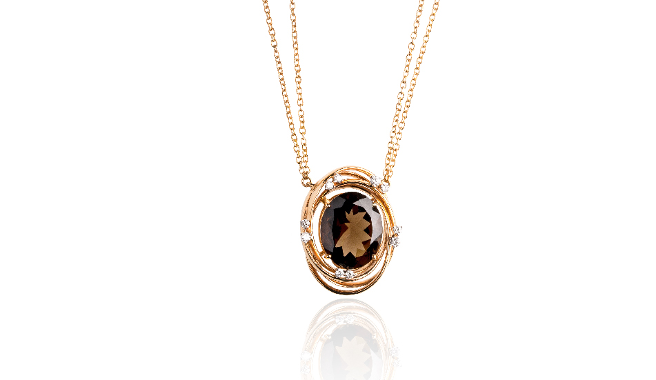 <p>18kt pink gold pendant with smoky quartz and diamonds</p>