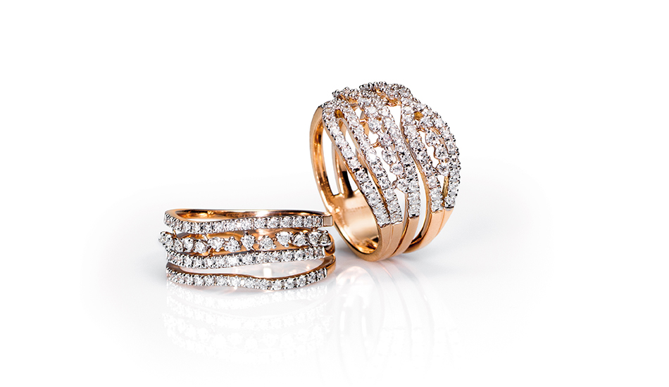 <p>18kt pink gold rings with white diamonds</p>