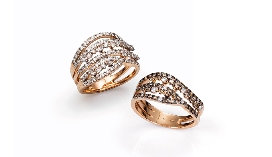 <p>18kt pink gold rings with white and brown diamonds</p>