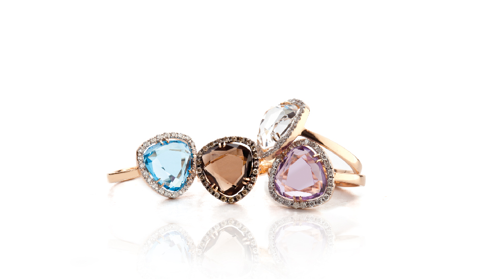 <p>18kt pink gold rings with blue topaz, smoky quartz, amethyst, crystal rock and diamonds</p>